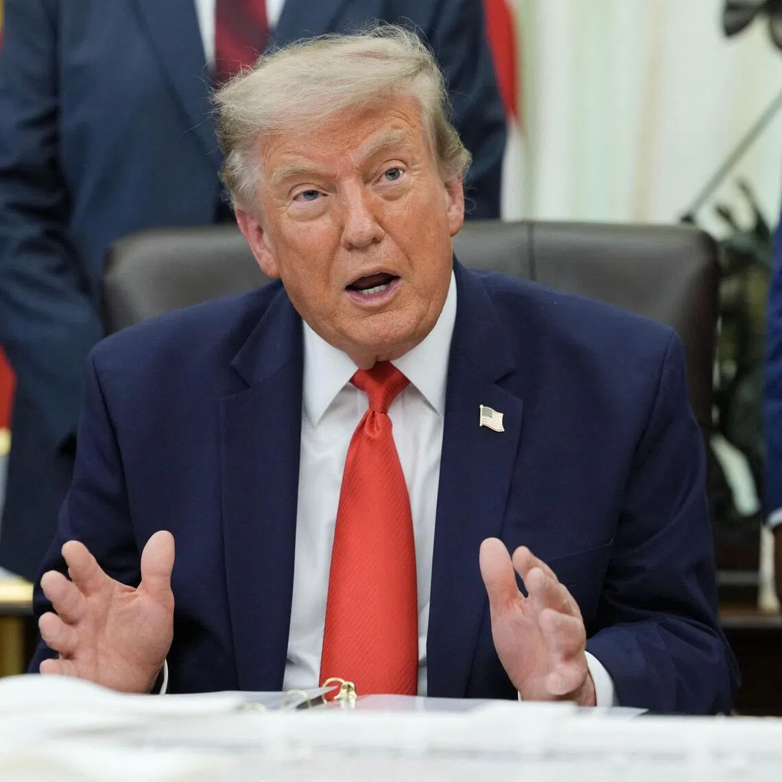 US President Donald Trump addressing the media in the Oval Office of the White House on July 29.