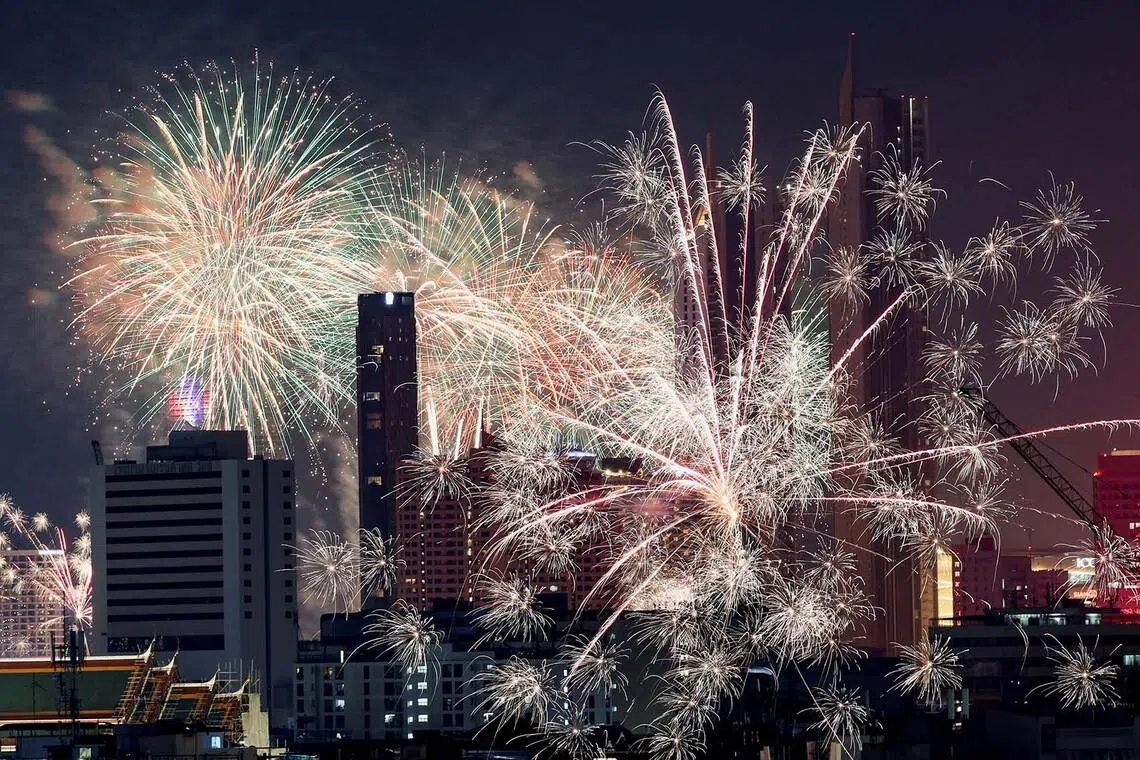 Fireworks exploding during the New Year celebrations in Bangkok, Thailand, Jan 1, 2026. 