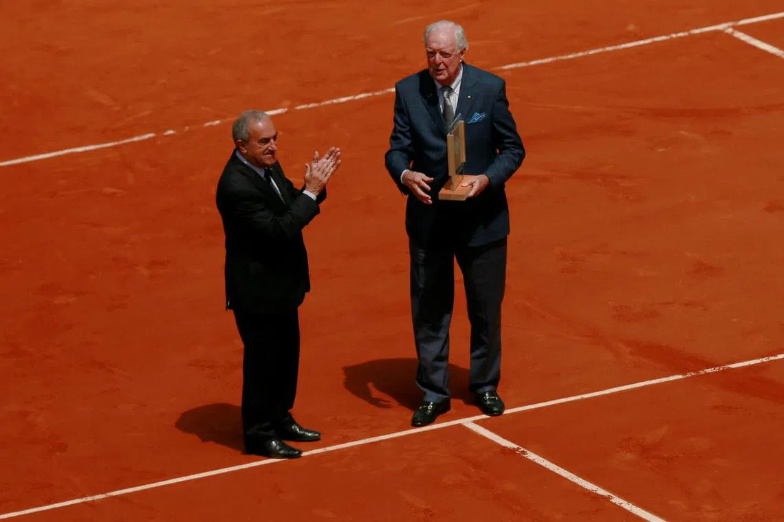 FILE PHOTO: Tennis - French Open - Roland Garros, Paris, France - 30/5/15  Mens Singles -  Former Austrailan player Fred Stolle is presented with an award by FFT President Jean Gachassin   Action Images via Reuters / Jason Cairnduff  Livepic/File Photo
