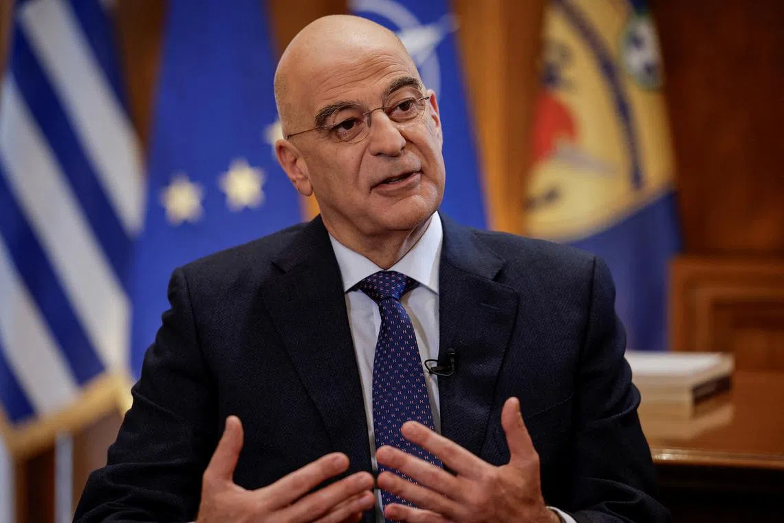 FILE PHOTO: Greek Defence Minister Nikos Dendias speaks during an interview with Reuters at the Ministry of Defence in Athens, Greece, March 1, 2024. REUTERS/Louisa Gouliamaki/File Photo