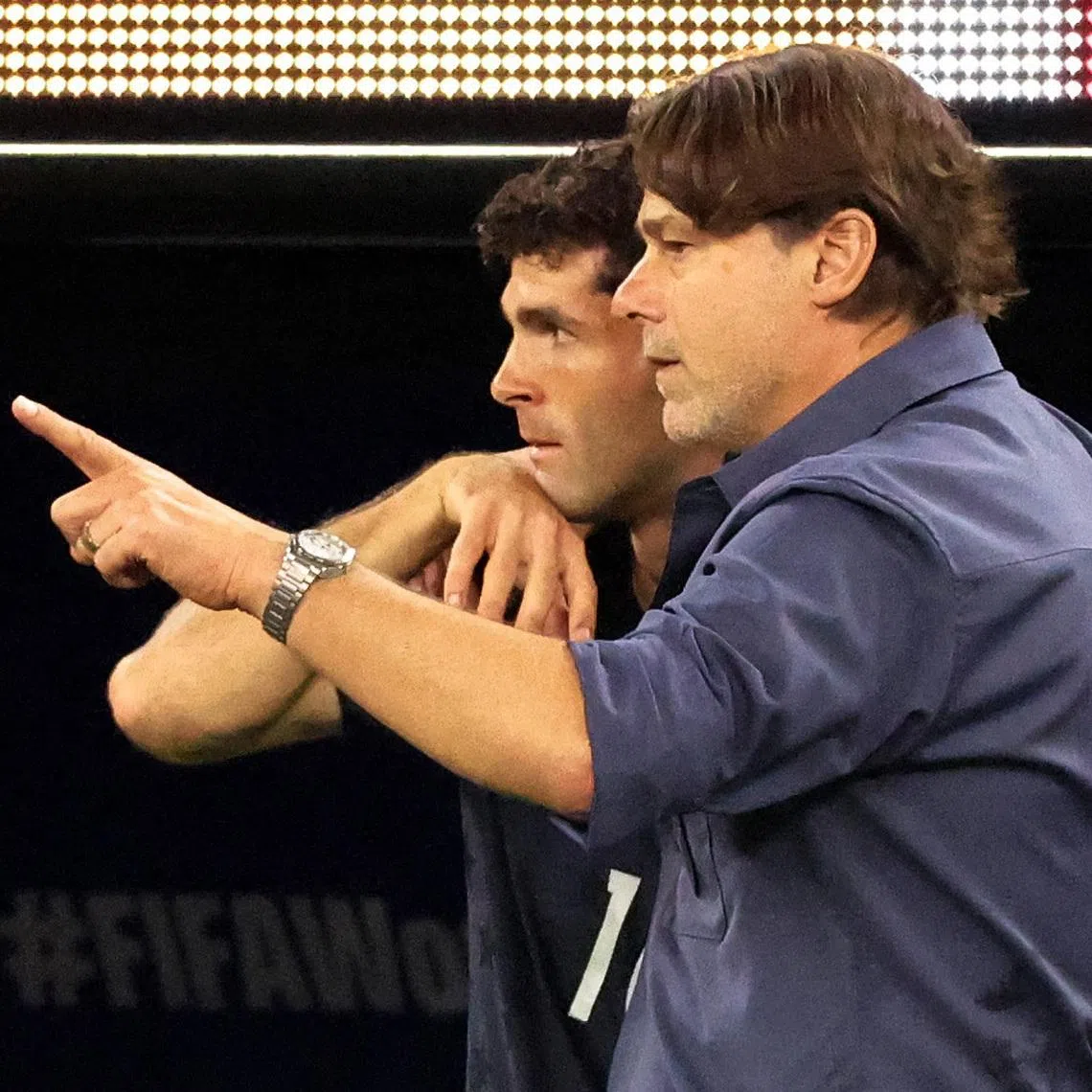 US coach Mauricio Pochettino giving instructions to Christian Pulisic before he comes on as a substitute during the 3-2 World Cup defeat by Turkey at SoFi Stadium in Los Angeles on June 25.