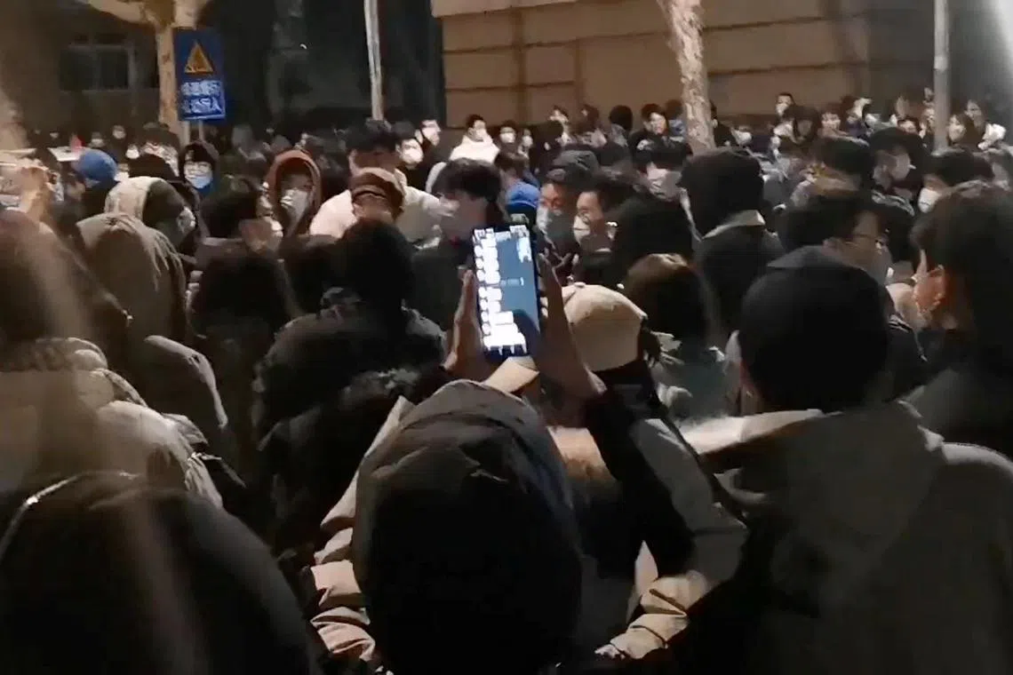 Students protest at the Nanjing Tech University demanding to be allowed to go home after a student tested positive for coronavirus disease (COVID-19) in Nanjing, Jiangsu Province, China, in this screen grab obtained by REUTERS on December 6, 2022. THIS IMAGE HAS BEEN SUPPLIED BY A THIRD PARTY. NO RESALES. NO ARCHIVES.