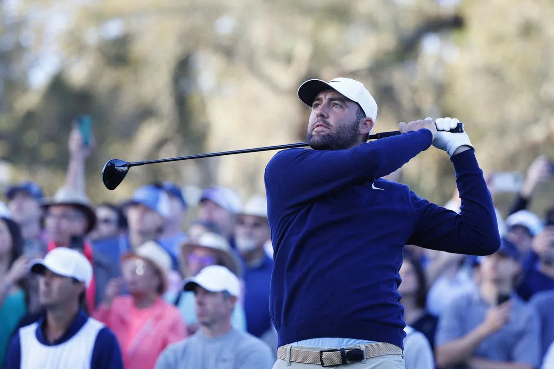 FILE PHOTO: Mar 14, 2025; Ponte Vedra Beach, Florida, USA; Scottie Scheffler hits off of the tenth tee during the second round of The Players Championship golf tournament at TPC Sawgrass. Mandatory Credit: Jeff Swinger-Imagn Images/File Photo