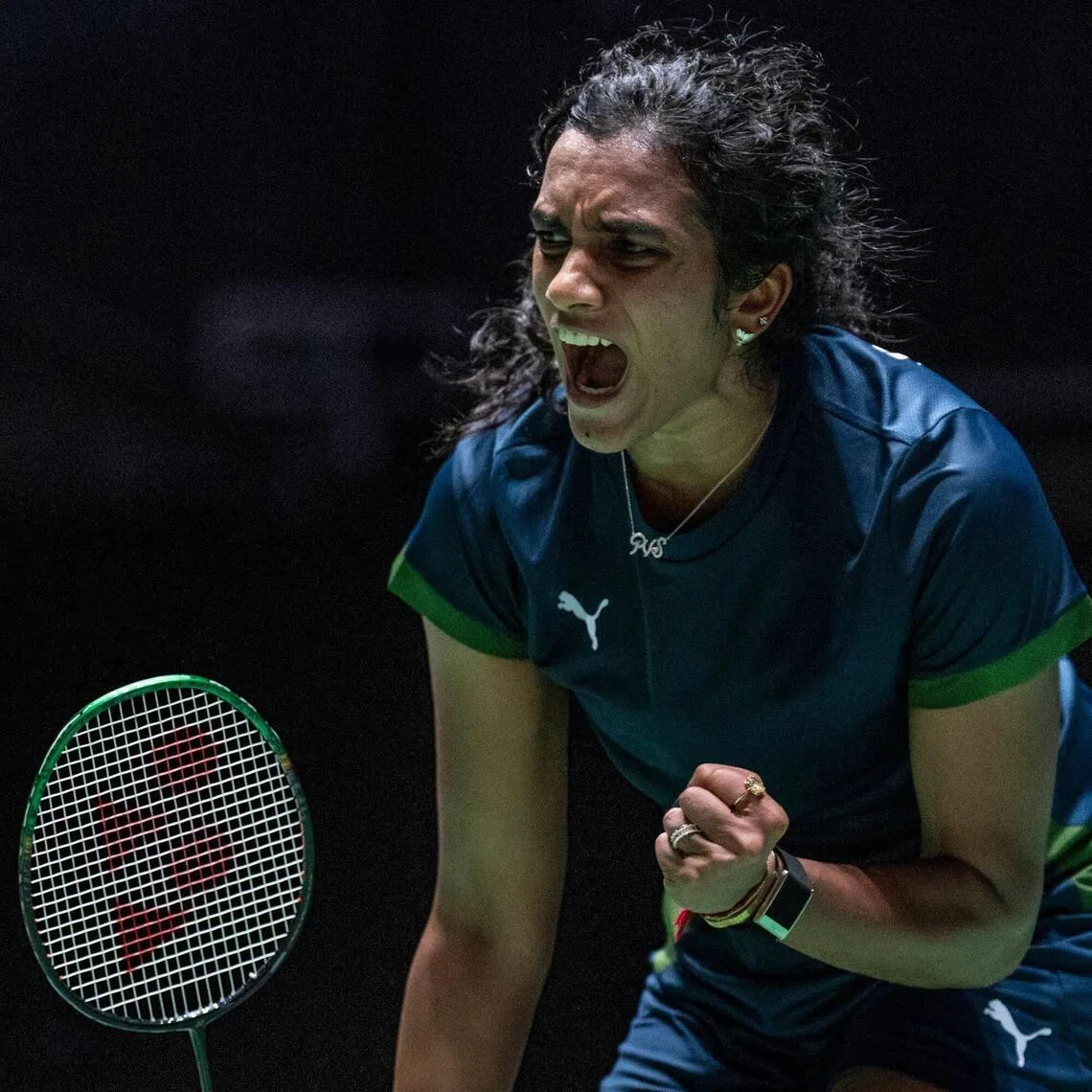 India’s Pusarla Venkata Sindhu reacts on a point against Japan’s Akane Yamaguchi in their women's singles final match of the Japan Open badminton tournament at Tokyo Gymnasium in Tokyo on July 19, 2026. (Photo by Yuichi YAMAZAKI / AFP)