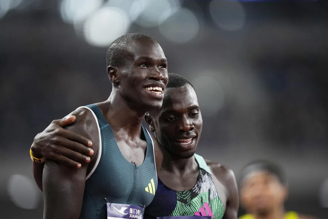 Athletics - Diamond League - Xiamen Diamond League - Egret Stadium, Xiamen, China - September 2, 2023 Kenya's Emmanuel Wanyonyi celebrates after winning the men's 800m final with second placed Canada's Marco Arop REUTERS/Aly Song/ File Photo