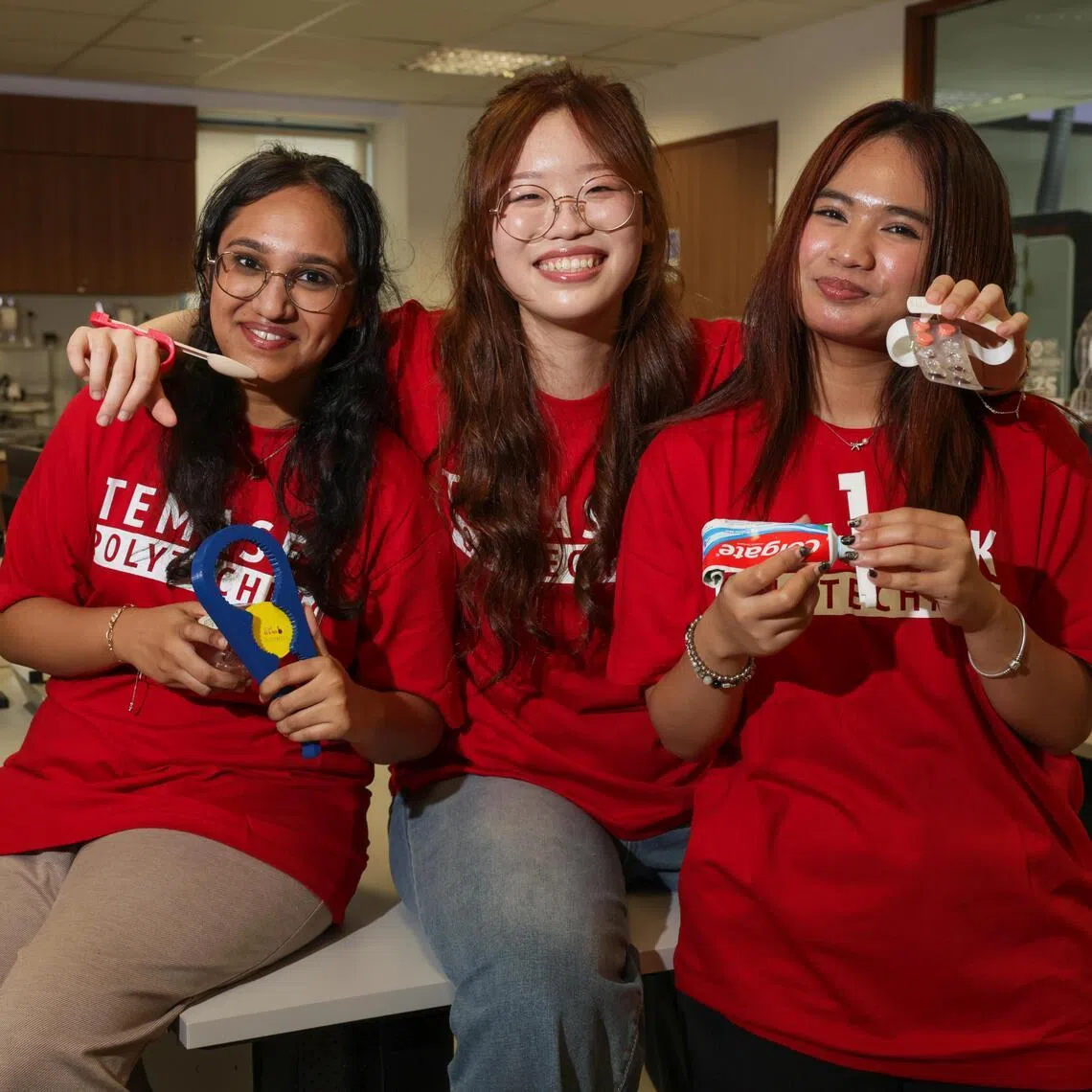 (From left) Ms Kontham Ishwarya, 20, Ms Joelle Chong, 20, and Ms Dayana Abdul Haddy, 20, are part of a team called PrintAid that designs 3D-printed assistive tools designed to support the senior’s daily activities.