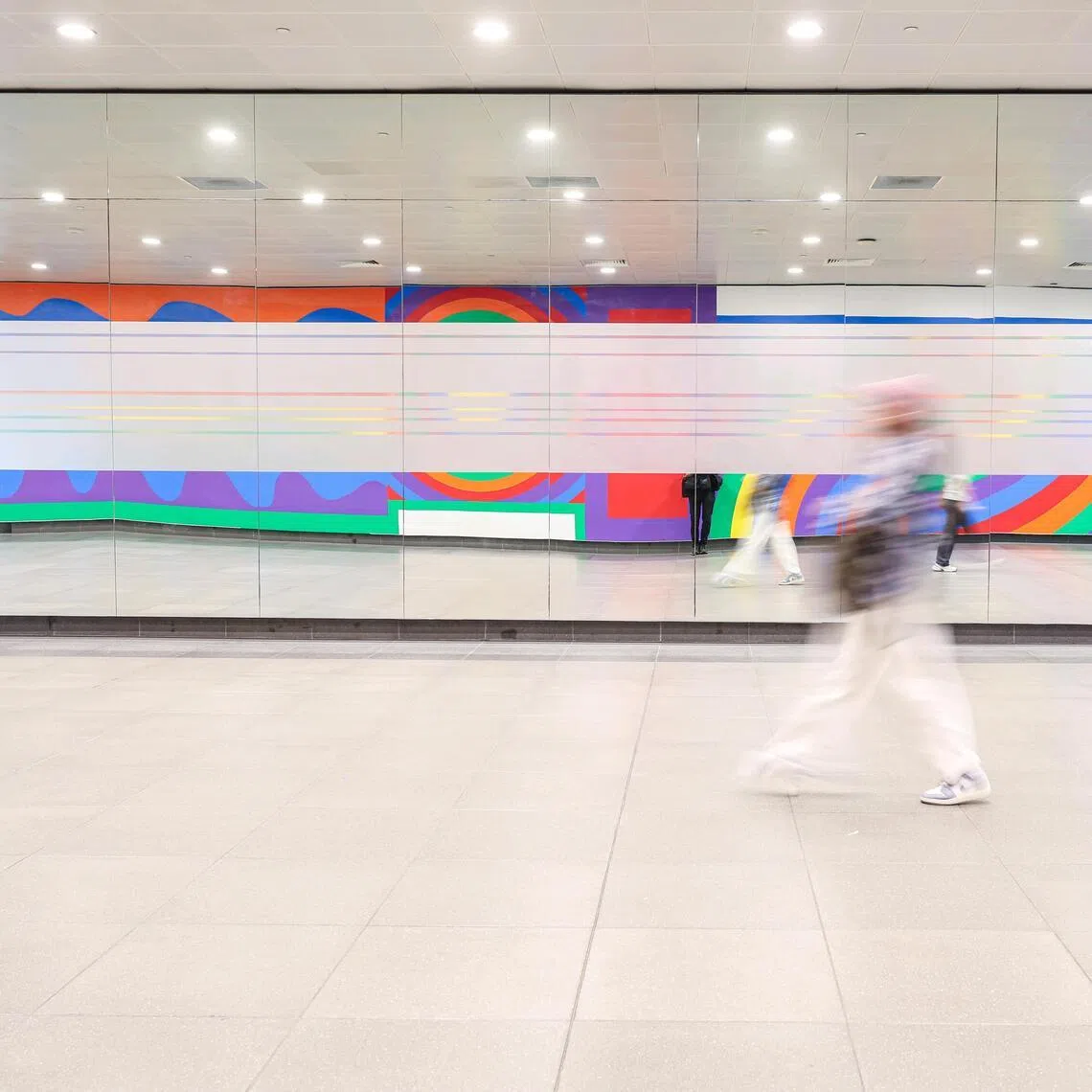 The full-length mirrors lining the underground linkway connecting Bayfront MRT station to Gardens by the Bay and Marina Bay Sands were frosted in January after “public feedback”. 