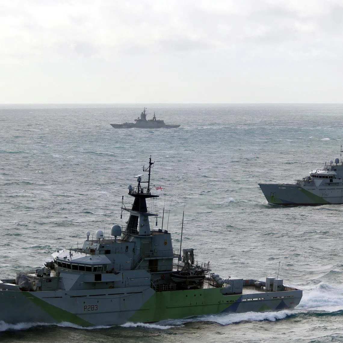 HMS Mersey (P283) and HMS Severn (P282), two River-class offshore patrol vessels of the British Royal Navy, shadow Russian corvette Boikiy, in the waters of the English Channel, in this handout image obtained by Reuters on January 23, 2026. UK MOD/Handout via REUTERS