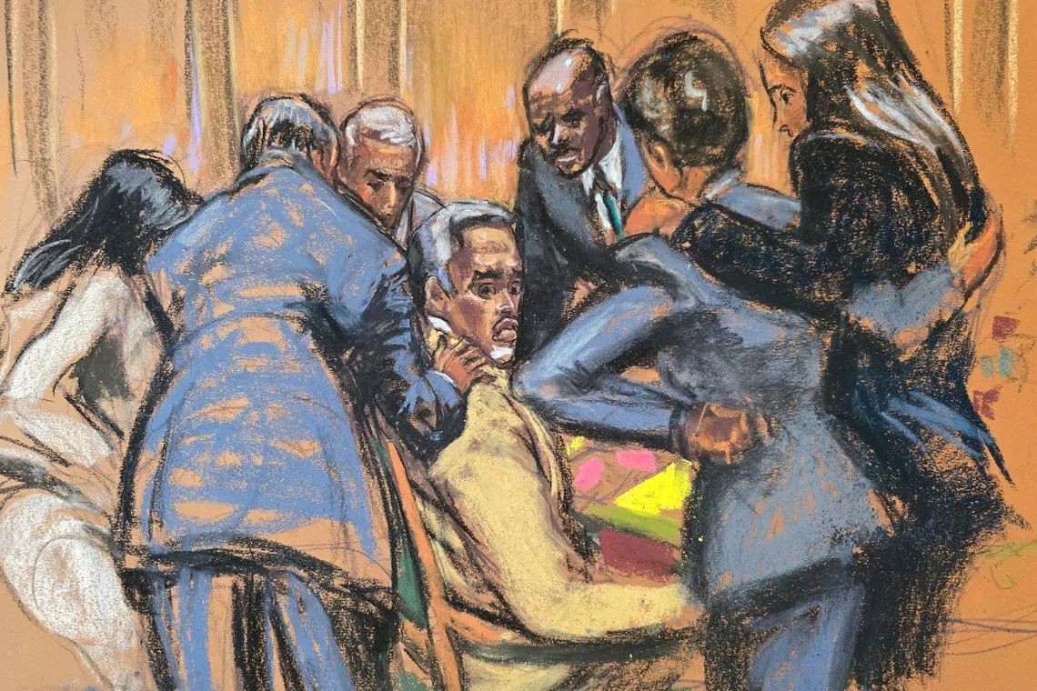 Defense lawyers comfort Sean 'Diddy' Combs during his trial in New York City, on July 1.