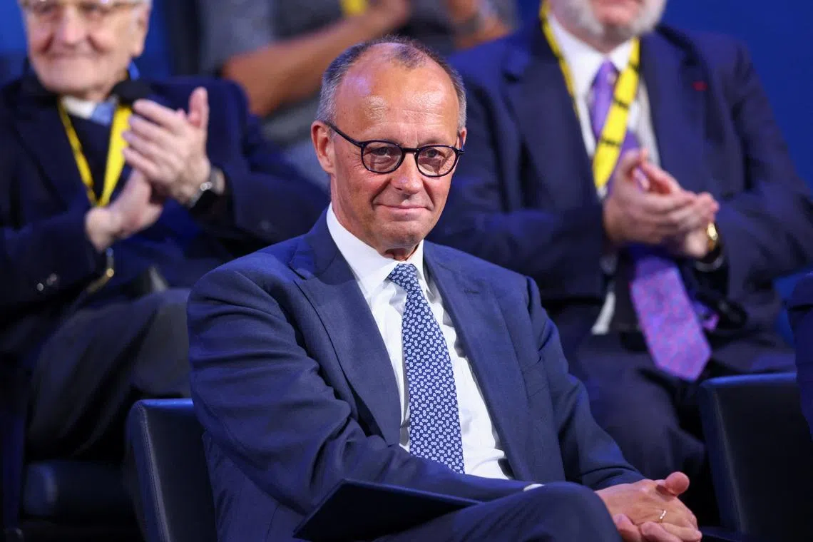 German Chancellor Friedrich Merz attends a ceremony to award European Central Bank (ECB) former President and Italian former Prime Minister Mario Draghi the International Charlemagne Prize (Karlspreis) 2026, in Aachen, Germany, May 14, 2026.    REUTERS/Thilo Schmuelgen