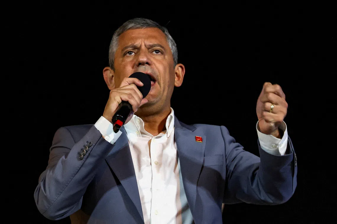 FILE PHOTO: Ozgur Ozel, leader of the main opposition Republican People's Party (CHP), gestures as he speaks during a rally protesting a recent court ruling that removed Ozgur Celik from the CHP's Istanbul provincial leadership, in Istanbul, Turkey, September 10, 2025. REUTERS/Umit Bektass/File Photo