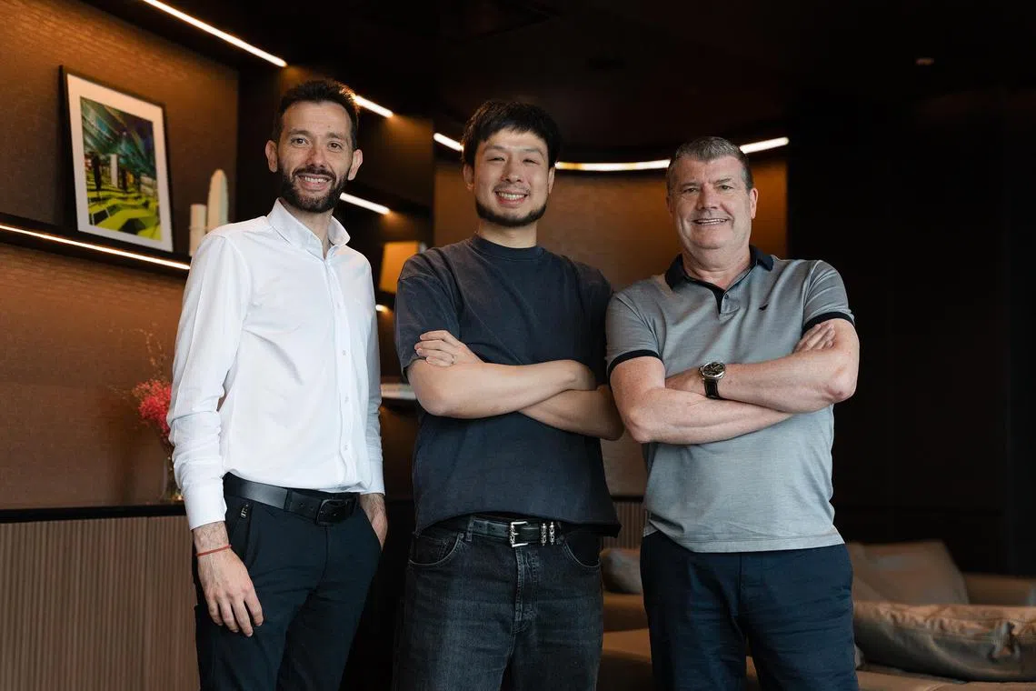 Valencia CF president Kiat Lim (centre) with newly hired chief executive officer Ron Gourlay (right) and manager Carlos Corberan.