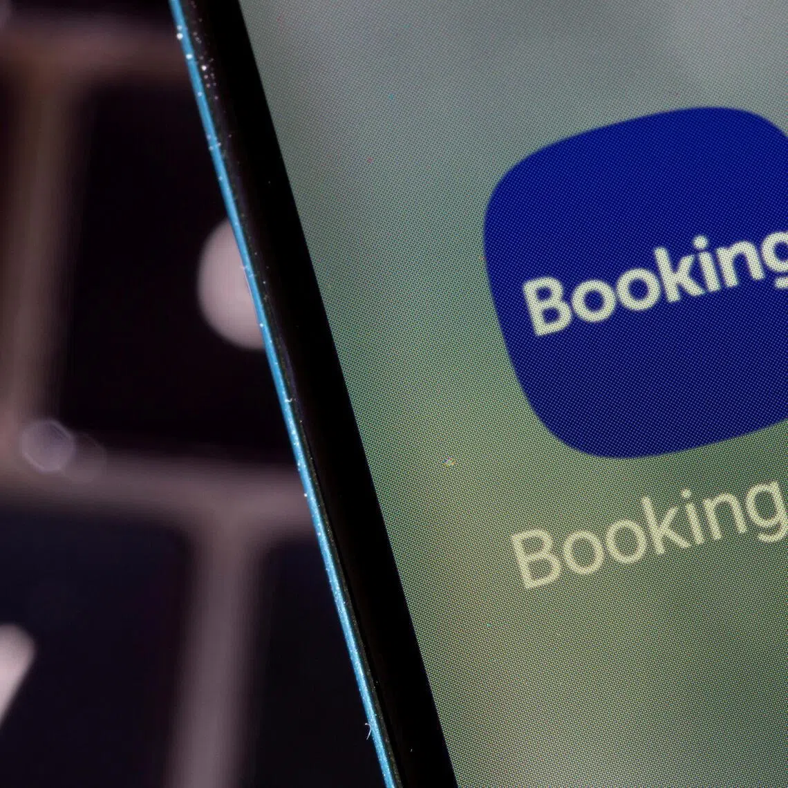 FILE PHOTO: Booking.com app is seen on a smartphone in this illustration taken February 27, 2022. REUTERS/Dado Ruvic/Illustration/File Photo