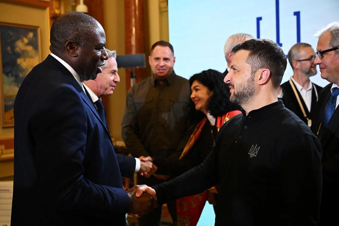 British Foreign Secretary David Lammy (left) is welcomed to Kyiv by Ukrainian President Volodymyr Zelensky, on Sept 11.