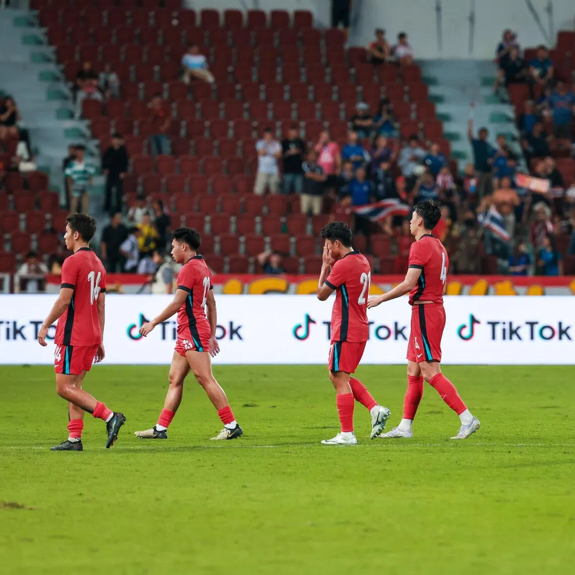Singapore men’s under-22 football players reacting after the final whistle during the group match against Thailand at the Rajamangala National Stadium during the Thailand Southeast Asian Games in Bangkok on Dec 11, 2025.