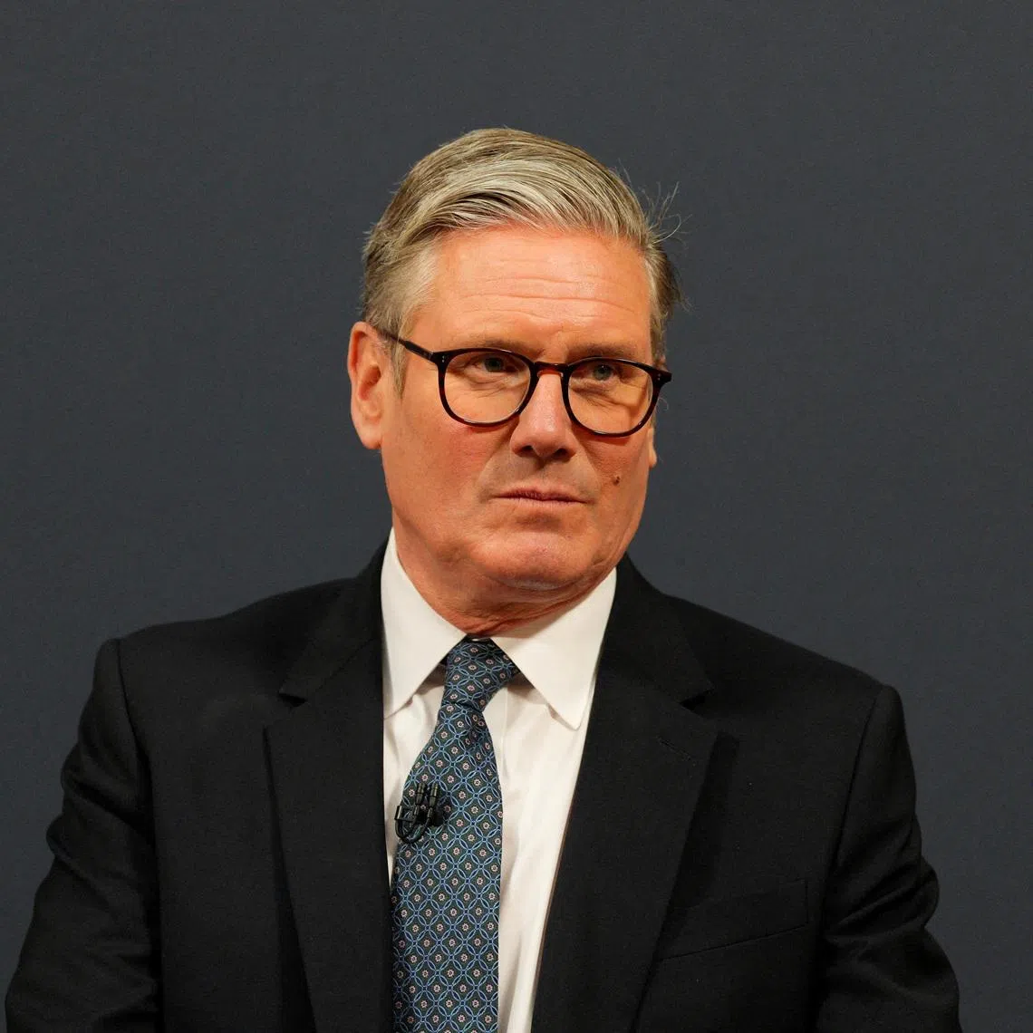 Britain's Prime Minister Keir Starmer looks on during a press conference at the UK-EU summit at Lancaster House on May 19, 2025 in London, England. Carl Court/Pool via REUTERS