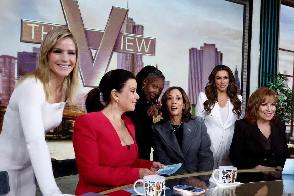 FILE PHOTO: Whoopi Goldberg gestures next to Democratic presidential nominee and U.S. Vice President Kamala Harris as they appear on ABC's "The View" in New York, U.S., October 8, 2024. REUTERS/Evelyn Hockstein/File Photo