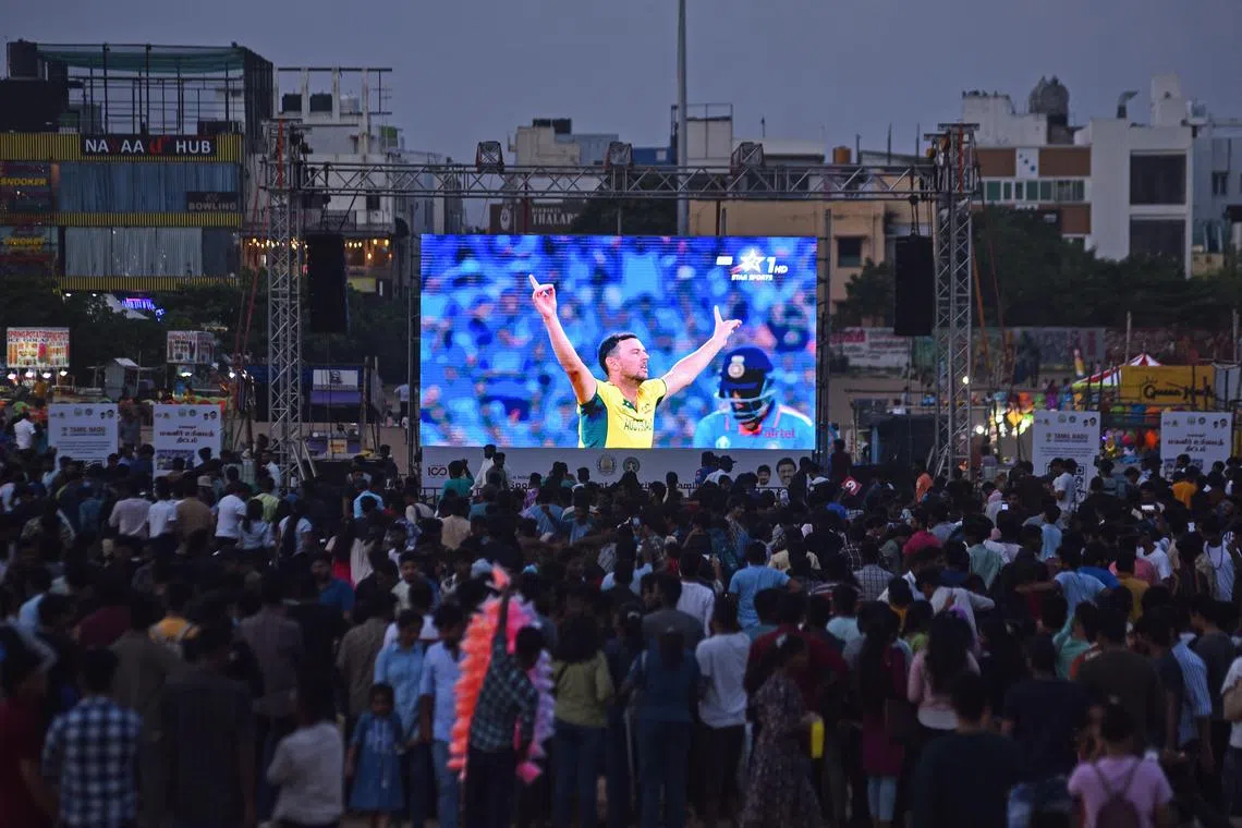 Indian cricket fans reacting as they watch the live telecast of the ICC Men's Cricket 2023 World Cup final match between India and Australia on a big screen in Chennai, India on Nov 19 2023