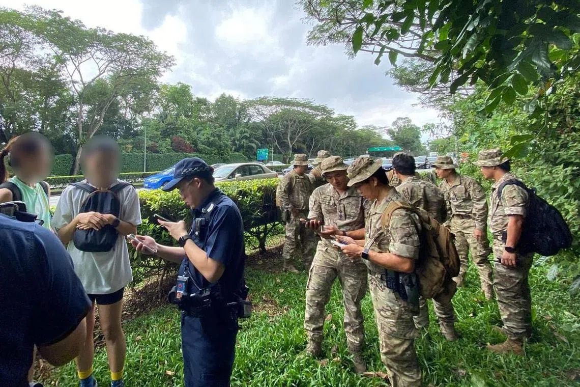 The hikers (far left) were found unhurt.