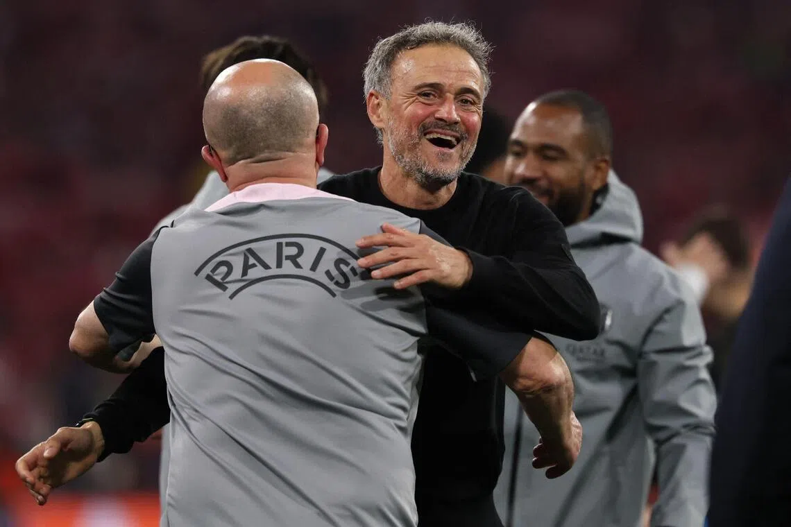 Paris Saint-Germain coach Luis Enrique celebrates at the end of the Champions League match against Bayern Munich.