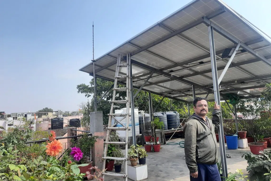 ddsolar - Mr Amit Mehta, with his rooftop solar unit that he set up in 2021, in Delhi. 

Credit: Debarshi Dasgupta