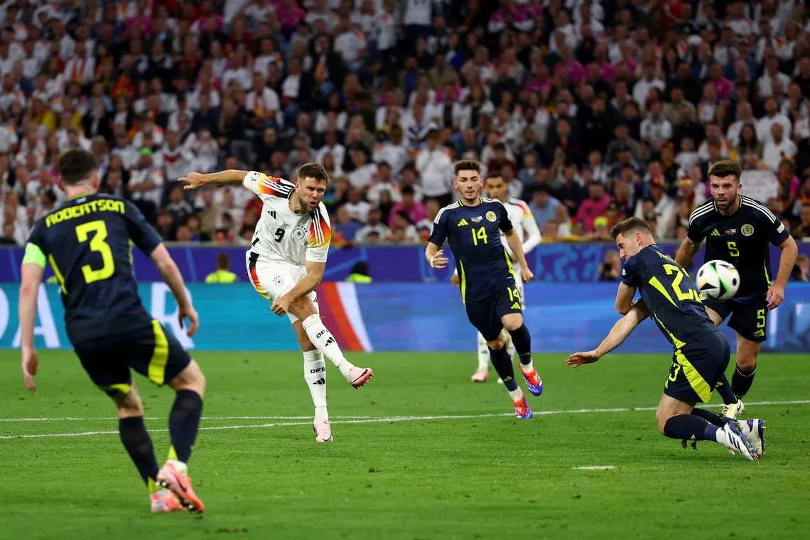 Soccer Football - Euro 2024 - Group A - Germany v Scotland - Munich Football Arena, Munich, Germany - June 14, 2024 Germany's Niclas Fullkrug scores their fourth goal REUTERS/Leonhard Simon