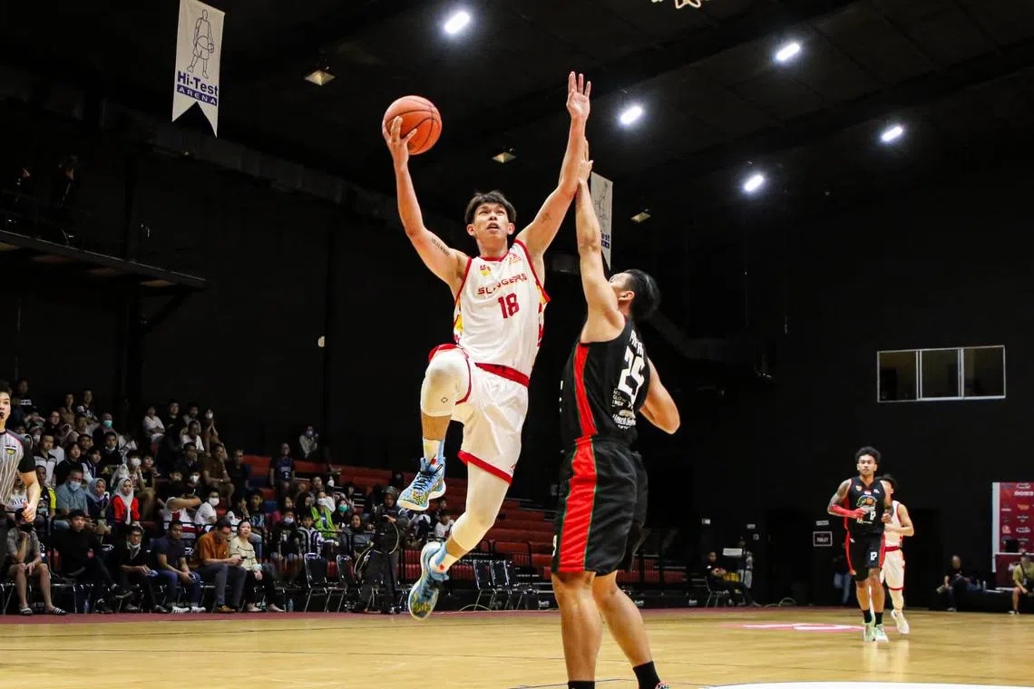 Jackson Mah in action as the Singapore Slingers recorded a dominant 138-83 victory over Louvre Surabaya in the 2023 Asean Basketball League Invitational in Batam on Jan 18.