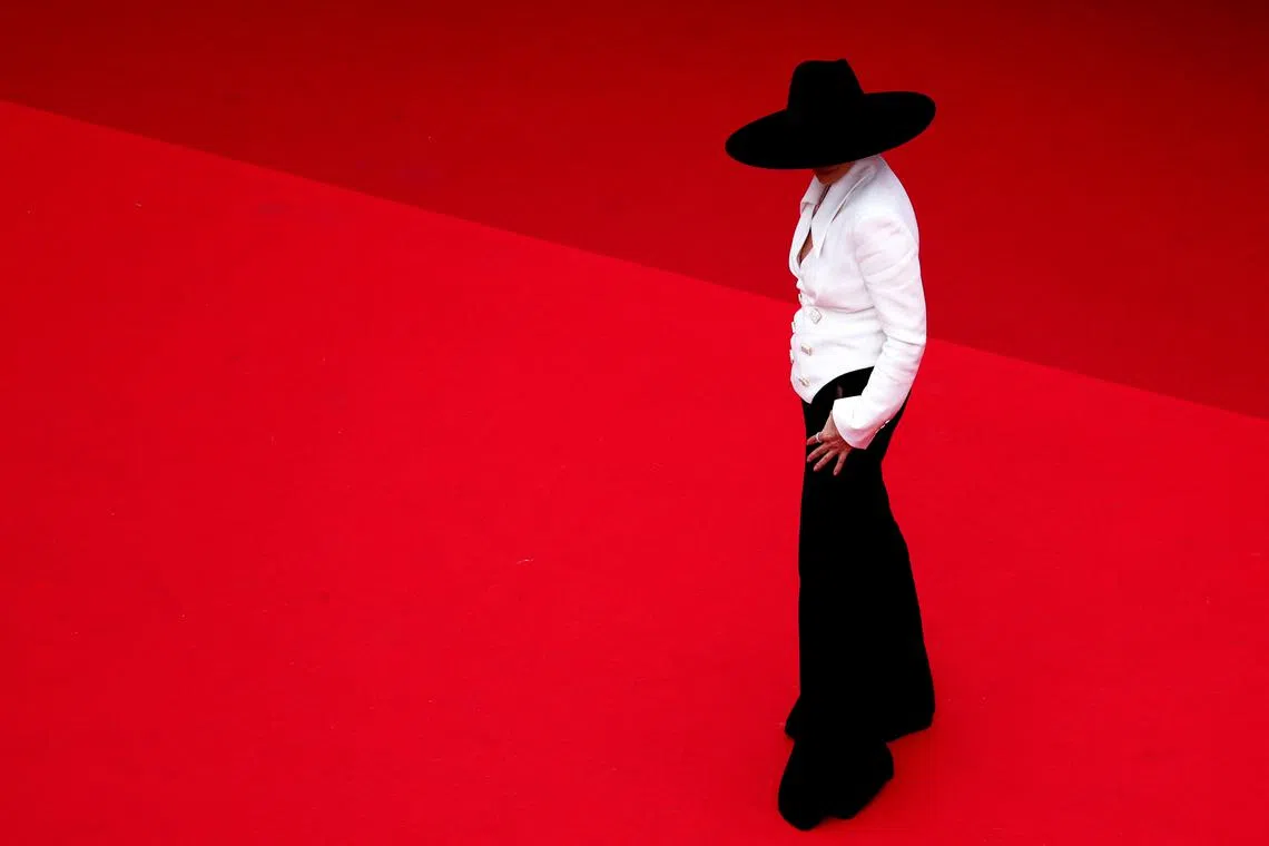 French actress Emmanuelle Beart arriving for the opening ceremony and the screening of the film "Jeanne du Barry" during the 76th edition of the Cannes Film Festival in Cannes, southern France, on May 16.