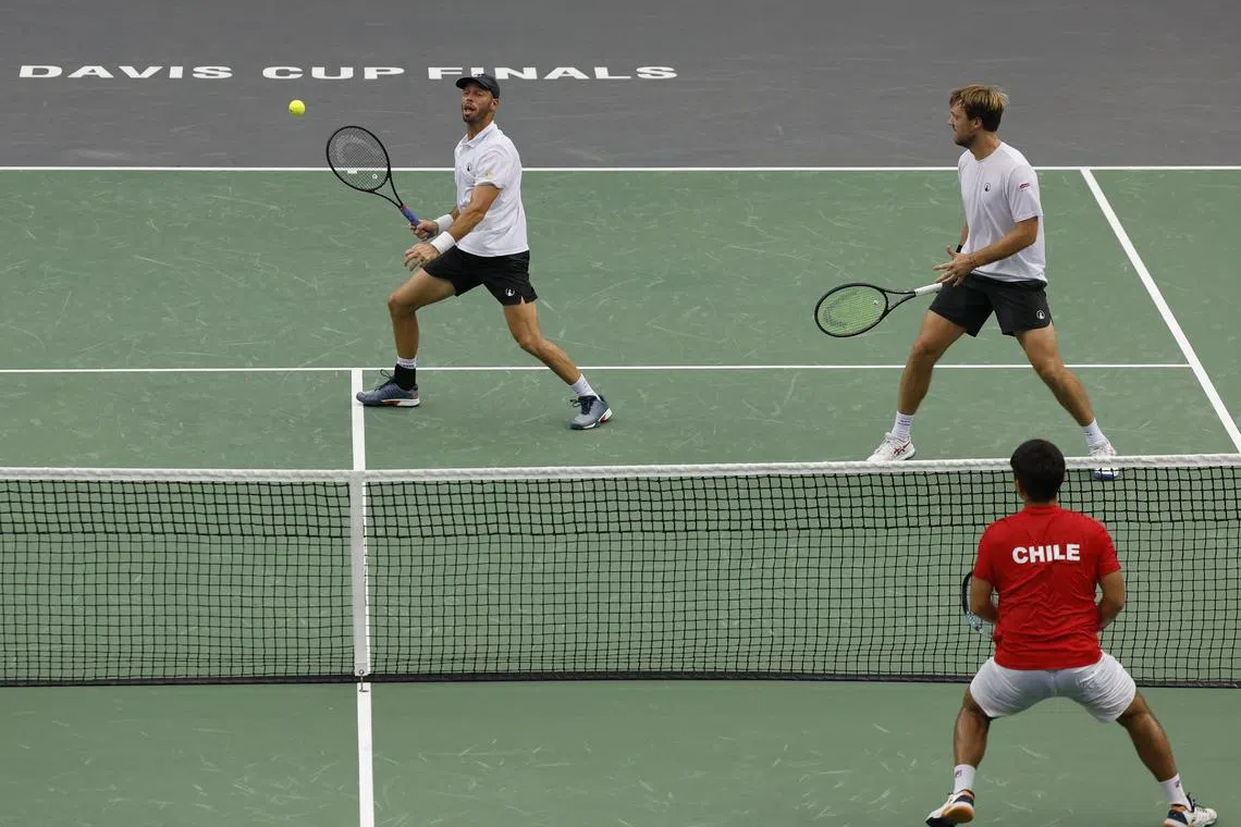 Germany's Kevin Krawiet and Tim Puetz in action during their doubles match against Chile's Tomas Barrios Vera and Matias Soto.