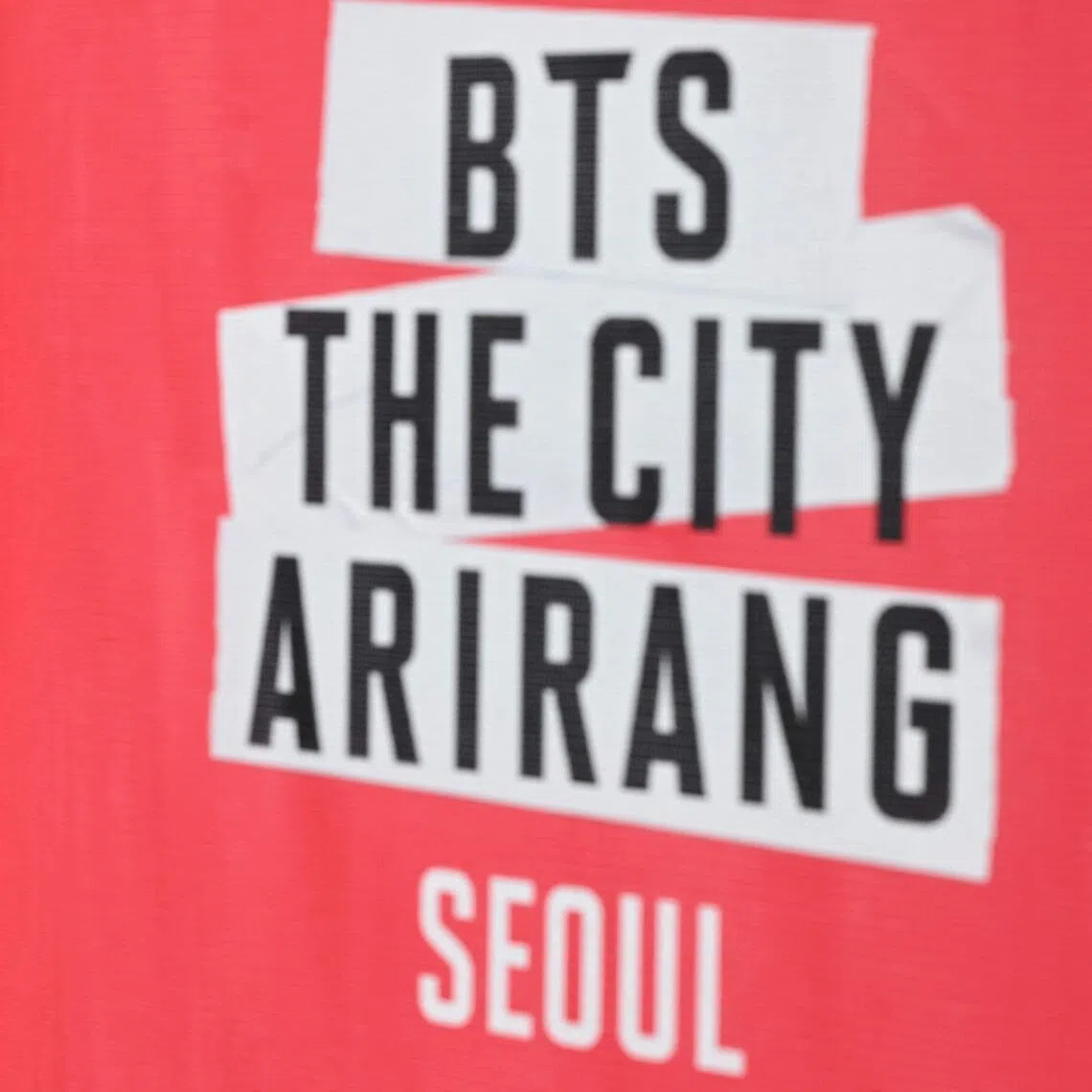 BTS fans wait in a line to enter a fan zone promoting the new album of K-pop boy band BTS at a riverside park in Seoul on March 20.