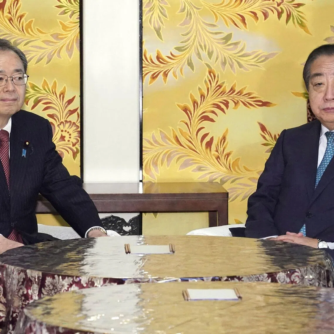 Leader of the Constitutional Democratic Party of Japan (CDP) Yoshihiko Noda (right) and Komeito leader Tetsuo Saito attend a meeting in Tokyo on Jan 15, 2026. 