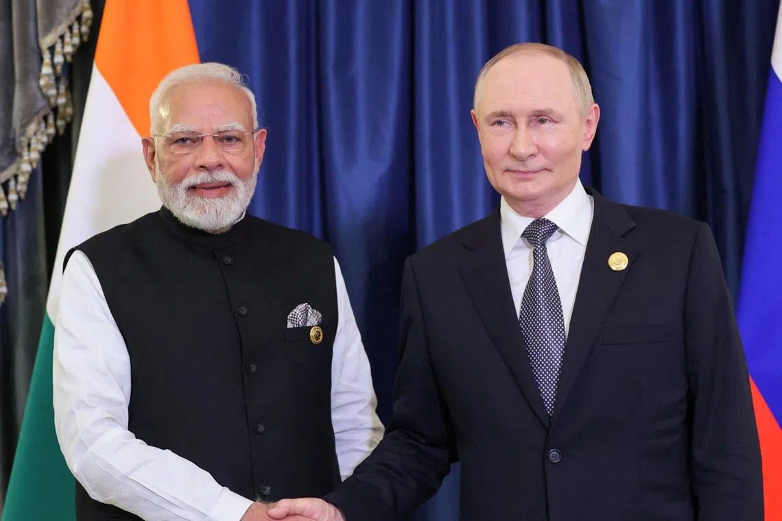 Indian Prime Minister Narendra Modi (left) and Russian President Vladimir Putin in Tianjin, China, on Sept 1.