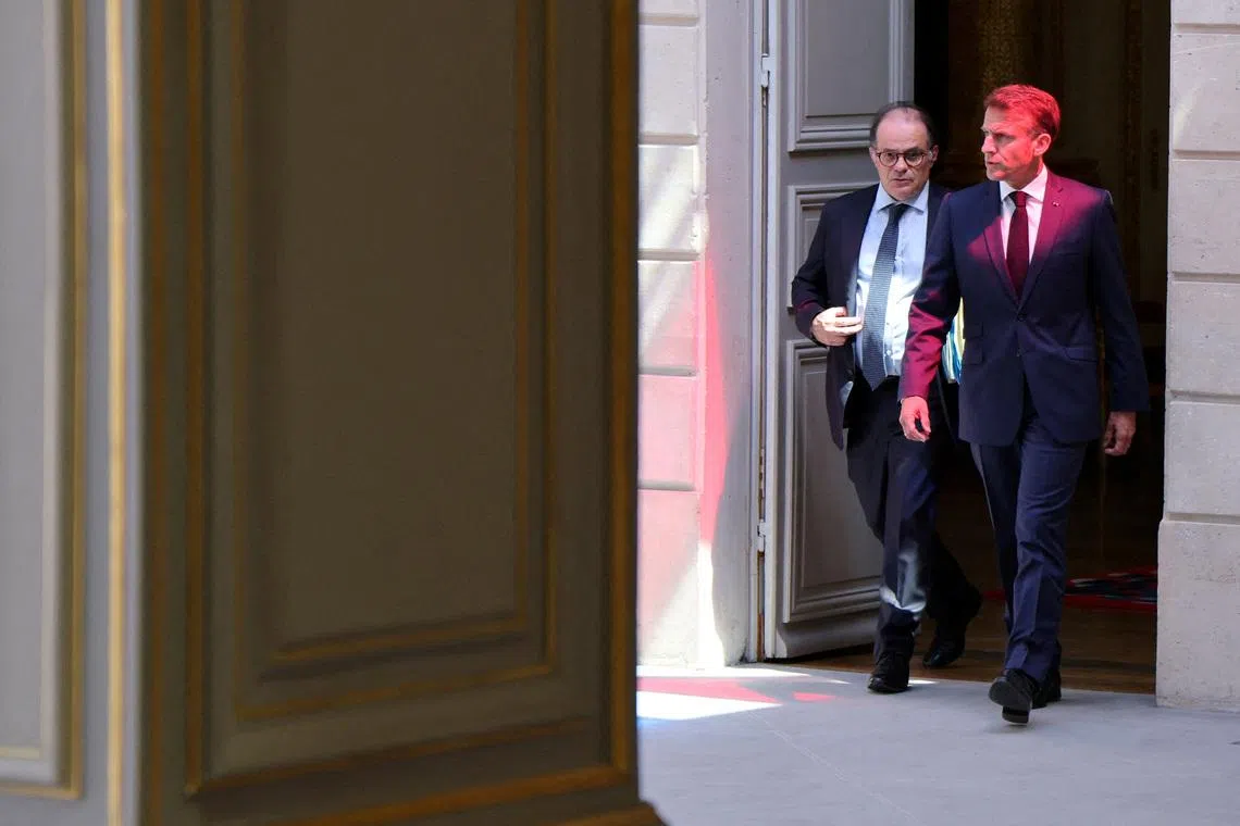 FILE PHOTO: Secretary General of the French Presidency Emmanuel Moulin walks with France's President Emmanuel Macron as they attend a summit on New Caledonia at the Elysee Palace in Paris on July 2, 2025. LUDOVIC MARIN/Pool via REUTERS/File Photo