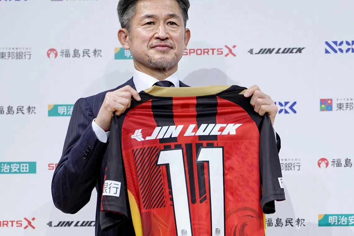 Japan's soccer player Kazuyoshi Miura, 58, known as 'King Kazu', poses for a photograph during his first news conference after joining Fukushima United in the J-League third division in Tokyo, Japan January 9, 2026, in this photo taken by Kyodo. Mandatory credit Kyodo/via REUTERS
