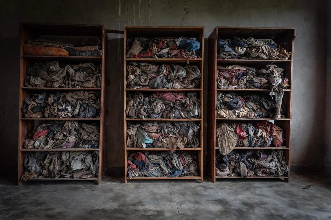 A general view of clothes of genocide victims on display at the Murambi genocide memorial in Nyamagabe, southern Rwanda, on April 21, 2022. Four memorials to the 1994 genocide in Rwanda of more than 800,000 people, mainly Tutsi, were added to UNESCO's World Heritage list Wednesday, the UN cultural body said.
The sites at Nyamata, Murambi, Gisozi and Bisesero commemorating the mass killings were "just inscribed on the UNESCO World Heritage list", the organisation posted on X (formerly Twitter). (Photo by Simon WOHLFAHRT / AFP)