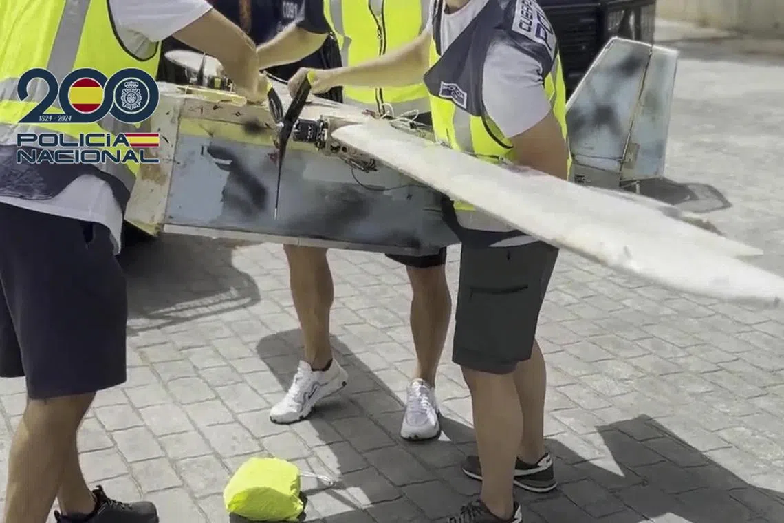 A still image taken from a video released by the Spanish police shows a drone manufactured in Ukraine with the capacity to transport up to 10 kilos of drugs per trip.