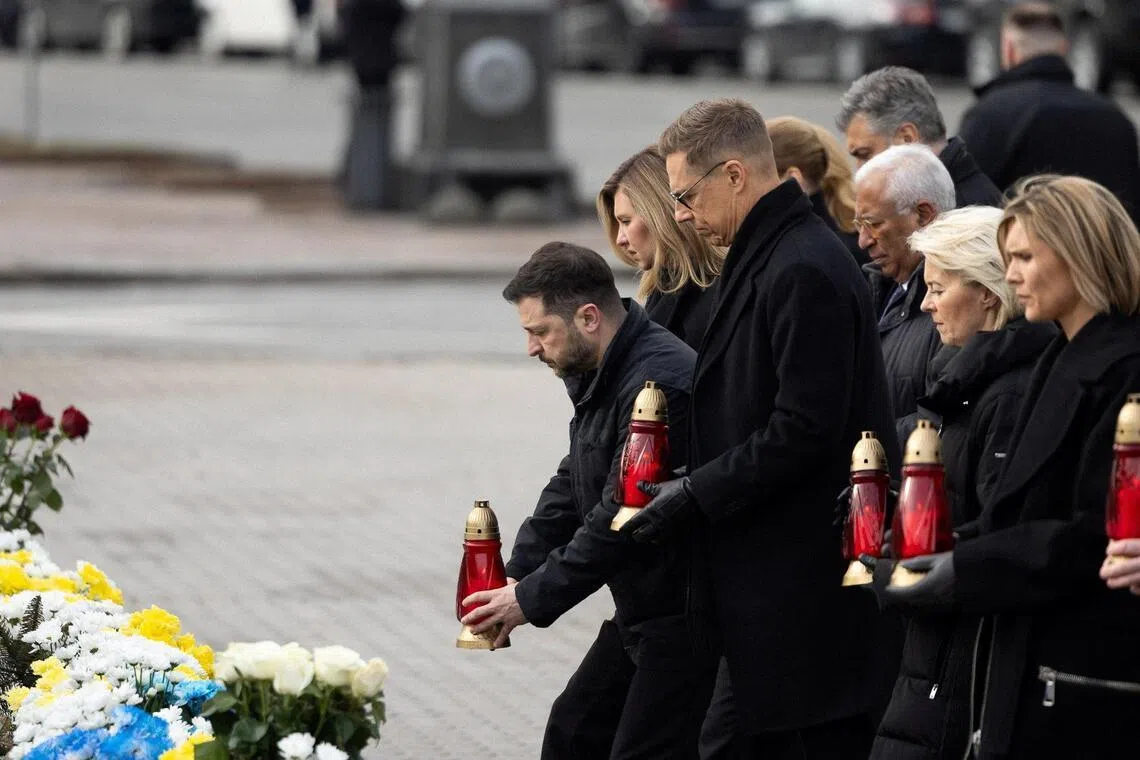 European leaders marking four years of Russia's war in Ukraine on Feb 24, with Ukrainian President Volodymyr Zelensky (left) and his wife Olena (second from left).