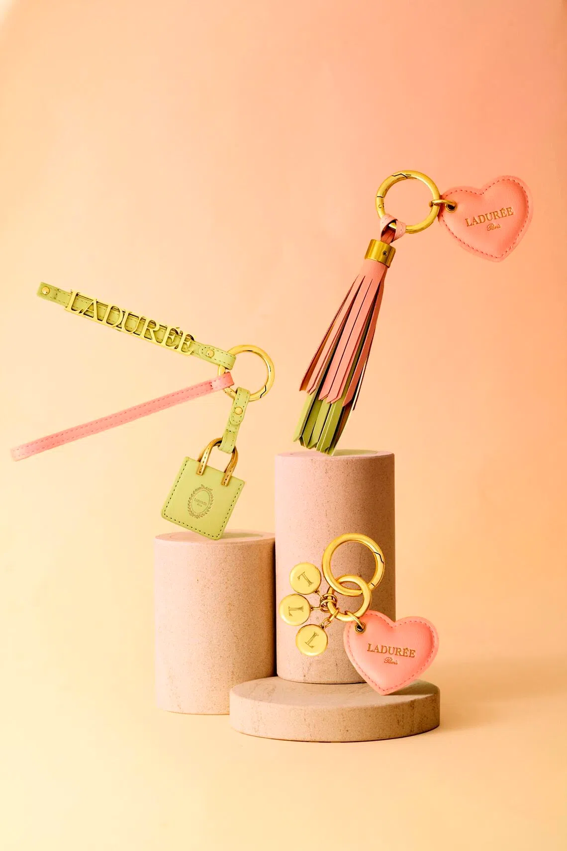 Laduree’s collectible keyrings inspired by the French brand’s pastel pink and mint-green hues.