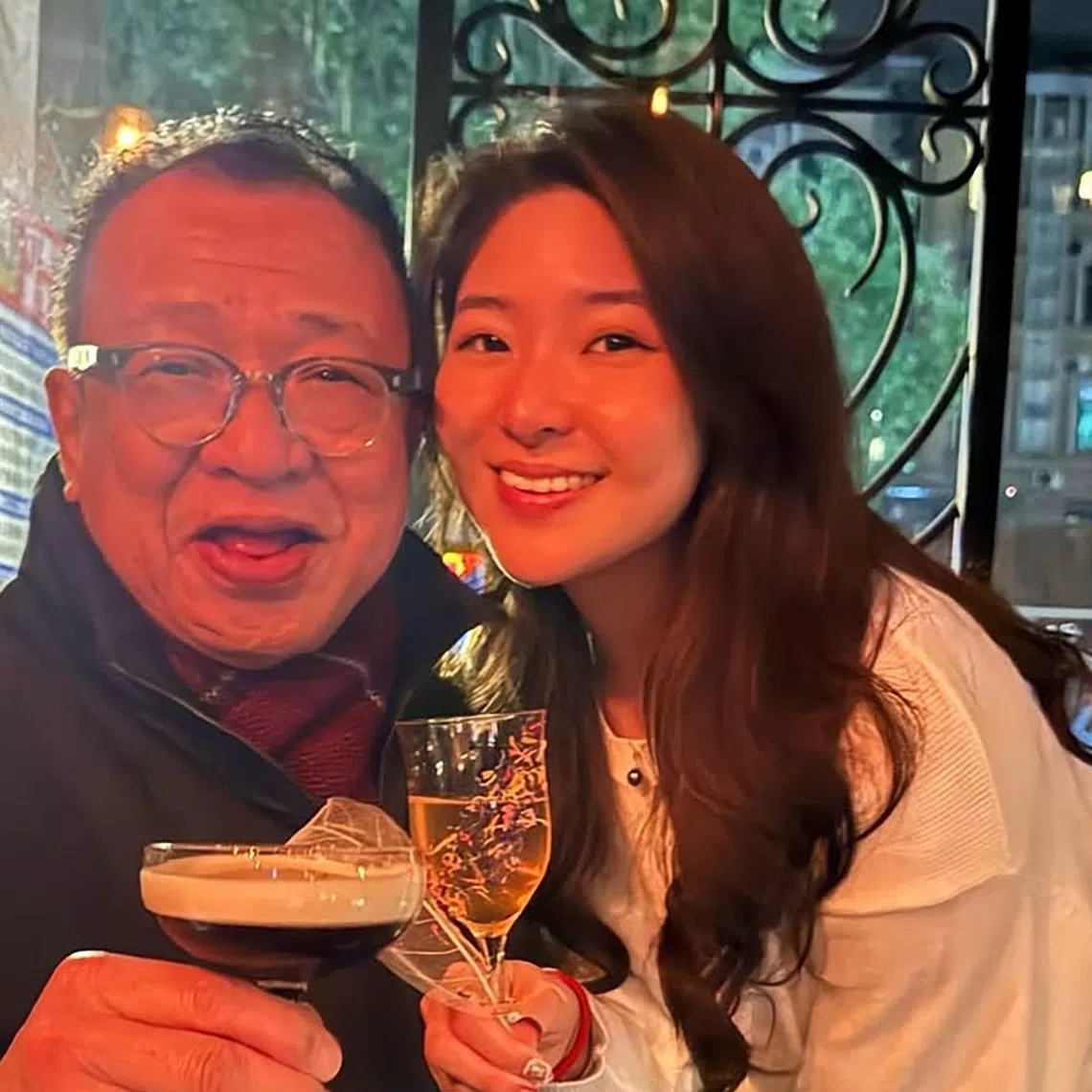 Ms Charmaine Hui with her late father Benz Hui.