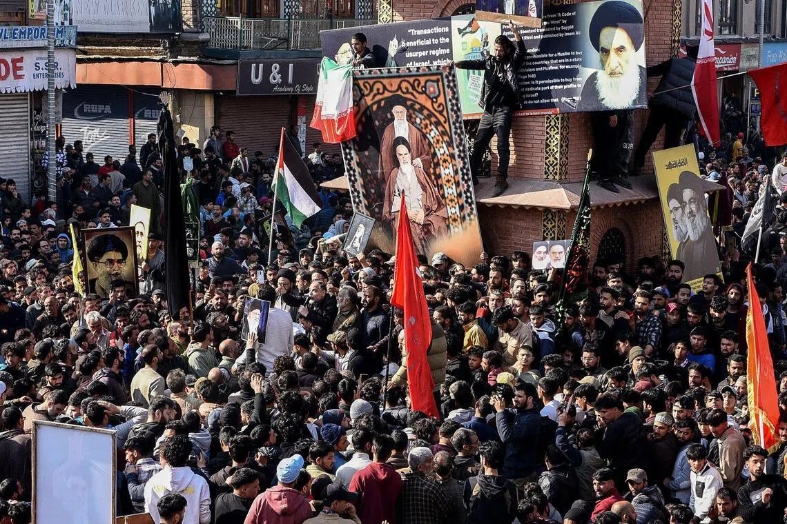 Shi’ite Muslims gather during an anti-US and Israel protest in Srinagar, in India-administered Kashmir, on March 1.