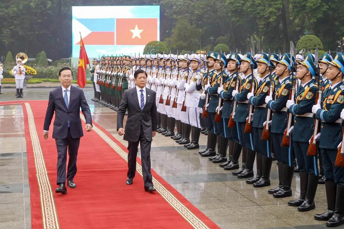Philippine President Ferdinand Marcos Jr is welcomed by Vietnam President Võ Văn Thưởng at the Presidential Palace on Jan 30, 2024.