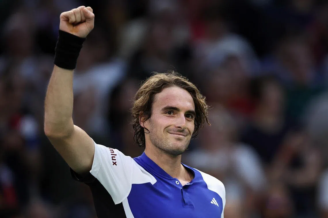 Greece's Stefanos Tsitsipas celebrates winning his round of 16 match against Francisco Cerundolo of Argentina at the Paris Masters tournament.