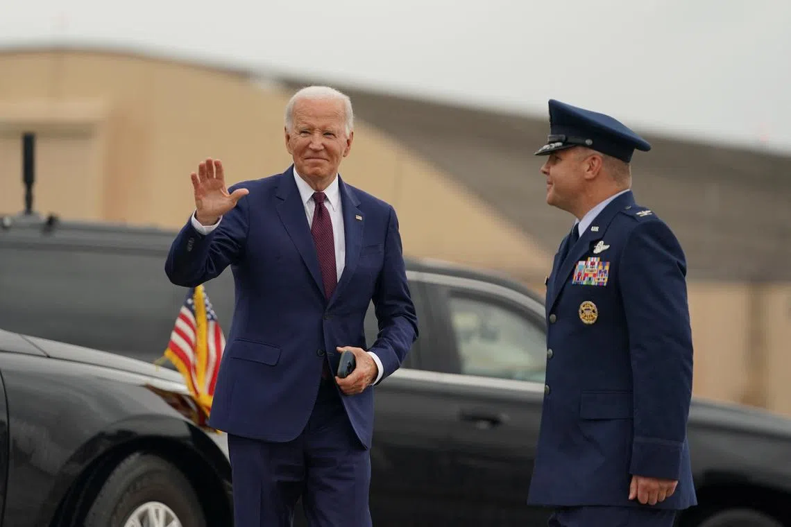U.S. President Joe Biden waves before boarding Air Force One as he departs for Wilmington, Delaware from Joint Base Andrews in Maryland, U.S., August, 8, 2024. REUTERS/Nathan Howard/File photo