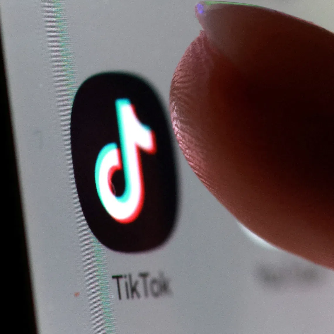 FILE PHOTO: The TikTok app icon on a smartphone in this illustration created on October 27, 2025. REUTERS/Dado Ruvic/Illustration/File Photo