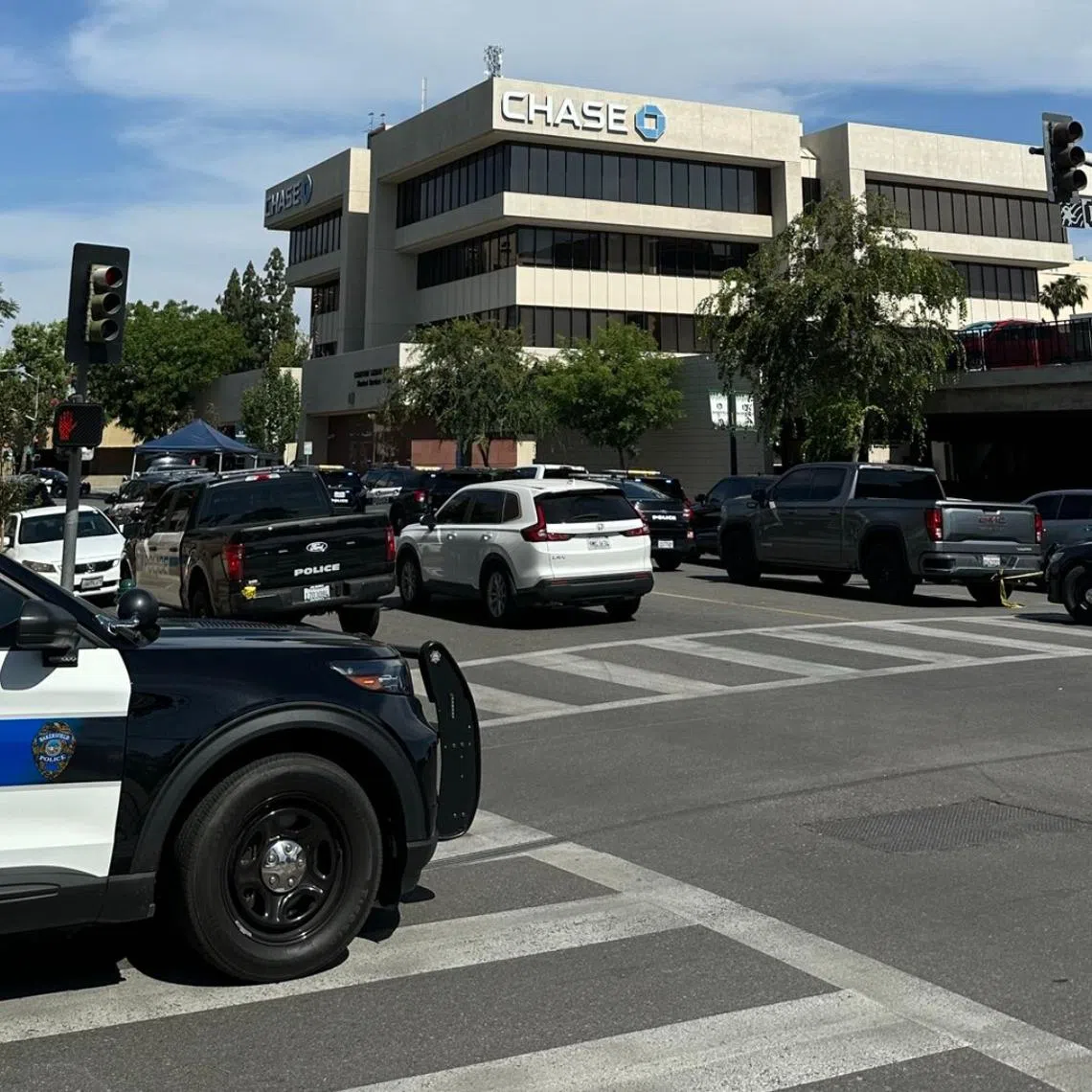 Two people were released after negotiators communicated with the hostage-taker by phone, police said.