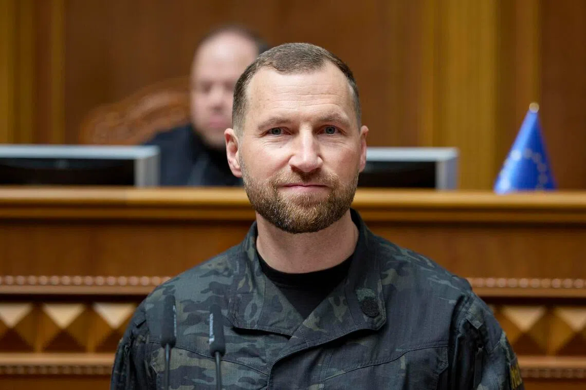 Newly-appointed Defence Minister Yevhenii Khmara - a former top special forces operative - delivering a speech at the Ukrainian Parliament in Kyiv on Aug 19.