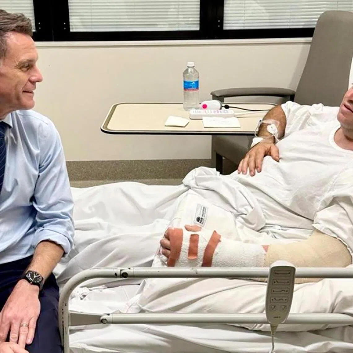 New South Wales Premier Chris Minns (left) visiting Bondi Beach hero Ahmed al-Ahmed at a hospital in Sydney on Dec 15, 2025. 
