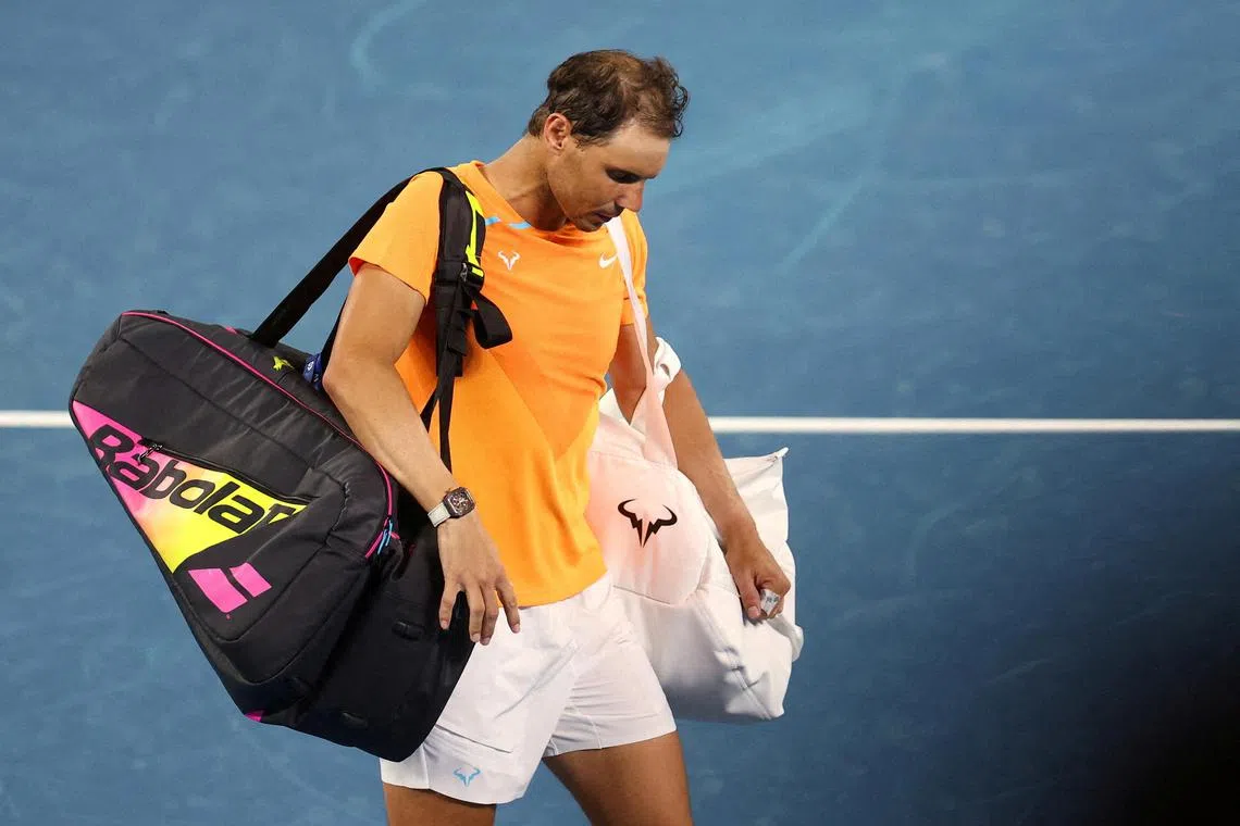 Spaniard Rafael Nadal looks dejected after losing his Australian Open second-round match to American  Mackenzie Mcdonald in Melbourne on Jan 18, 2023.