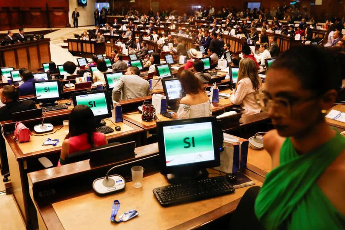 Members of Ecuador's National Assembly take part in a session, the first since President Guillermo Lasso dissolved the assembly, to elect a new head of the legislature, in Quito, Ecuador November 17, 2023. REUTERS/Karen Toro
