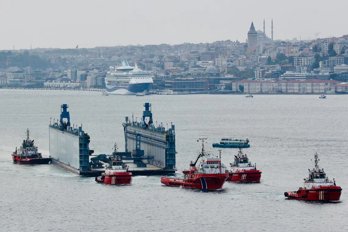 A Russian floating dock is towed by tugboats through Bosphorus to the Black Sea, in Istanbul, Turkey, September 18, 2024. REUTERS/Yoruk Isik/File Photo